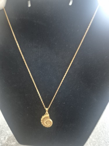Gold colour metal fossil - gold,